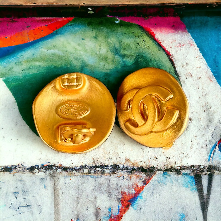 Chanel Vintage Bright Gold Double CVintage Chanel Clip Onās Bright Gold Double C Purchased at an Estate Sale These look like they were never ever worn Free from dings , scratches Gift Giving Condition 18K-24K Bright Gold These are amazing !! Very Rare in My Mama Found What