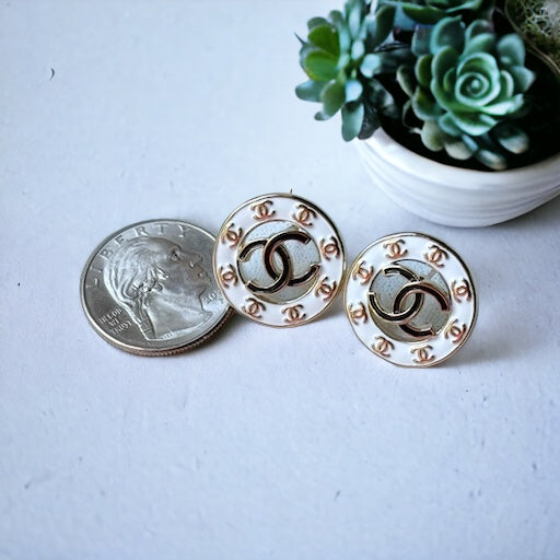 Chanel Gold , Strass & Enamel Double C Cut Out Round Post EarringsGorgeous In Like NEW condition Pre-owned free from dings , major signs of wear or scratches . Chanel Gold , Strass & Enamel Double C Cut Out Round Post Earrings Comes with the Chanel Gift B My Mama Found What