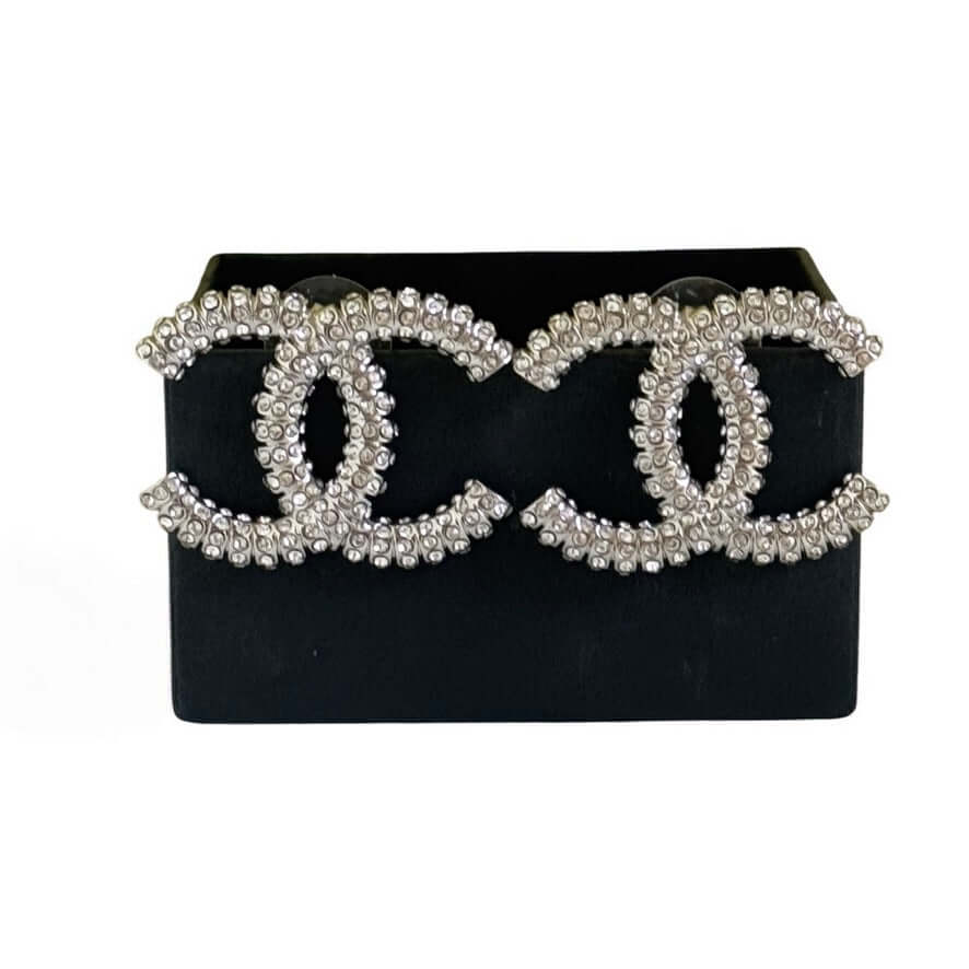 Chanel Silver CC Big Earrings encrusted with crystals, authentic pre-owned, perfect for a statement look.