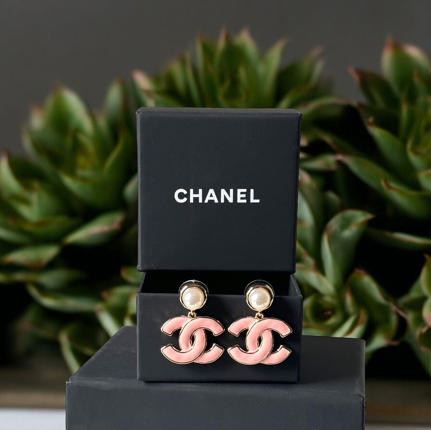Chanel Lighter Gold Strass Pearl Post with Bigger Pink Enamel Double C Dangle EarringsAdd some playful CoCo Chanel style to your look with these gorgeous earrings! These earrings are a statement piece that will never go out of style. Made in Italy, they f