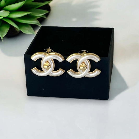 Authentic Chanel Gold CC with White Enamel Lock Earrings Pre-Owned