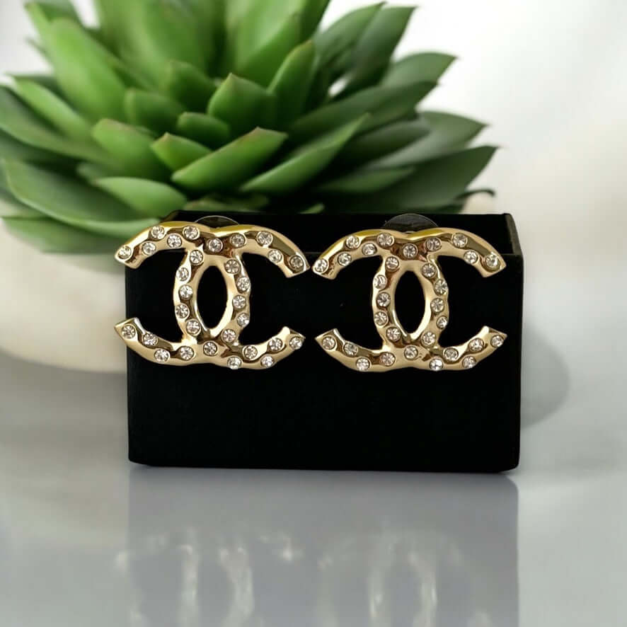 Authentic Chanel Gold CC earrings with crystals in excellent pre-owned condition, presented in a stylish gift box.