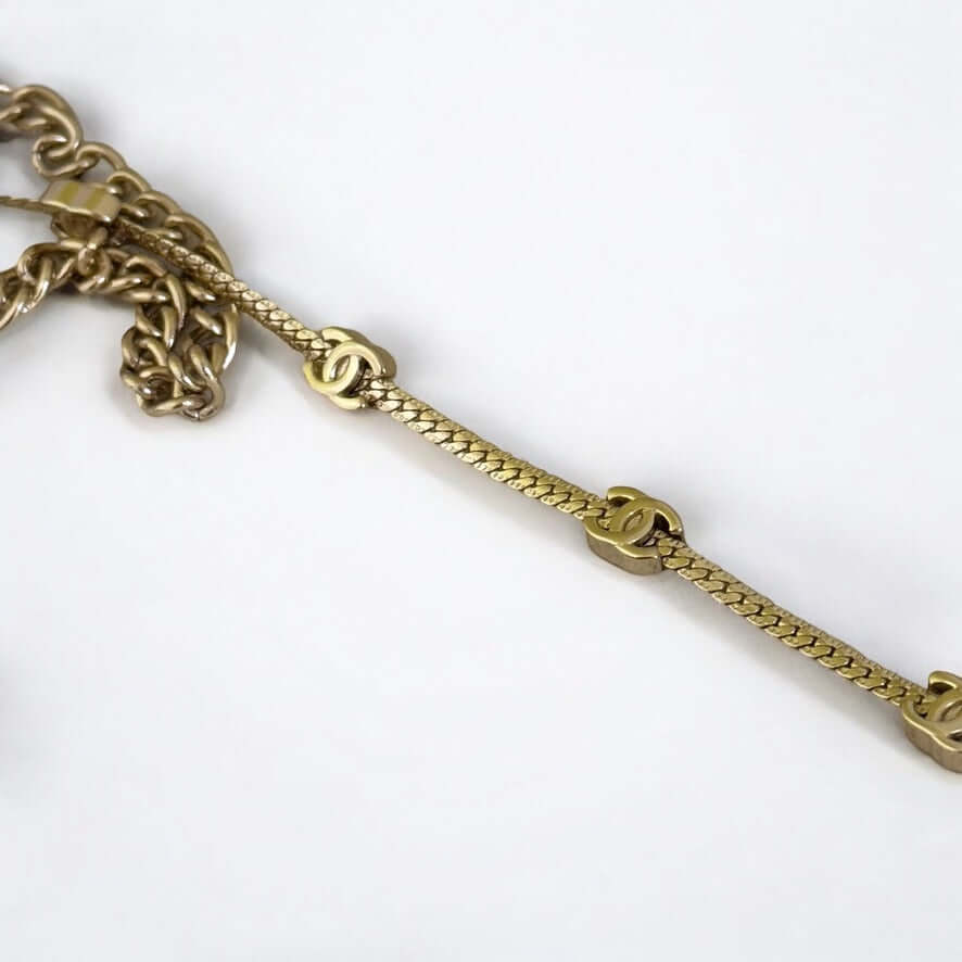 Chanel CC Gold Chain Necklace featuring gold plated mini CC details, adjustable length, and pre-owned charm.