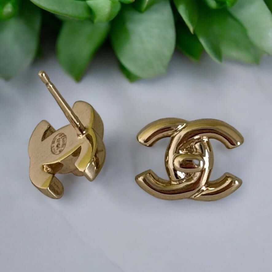 Chanel Gold CC Lock Smaller Post Earrings in iconic double C style, excellent condition, authentic, available with Chanel box and gift bag.