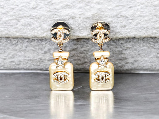 Chanel CC Perfume Gold /White Dangle Earrings - My Mama Found What  