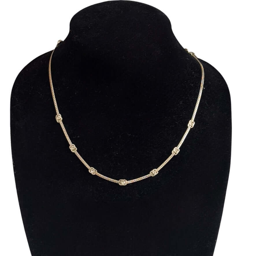 Chanel CC Gold Chain Necklace on display, featuring adjustable length and multi gold CC accents, perfect for any occasion.