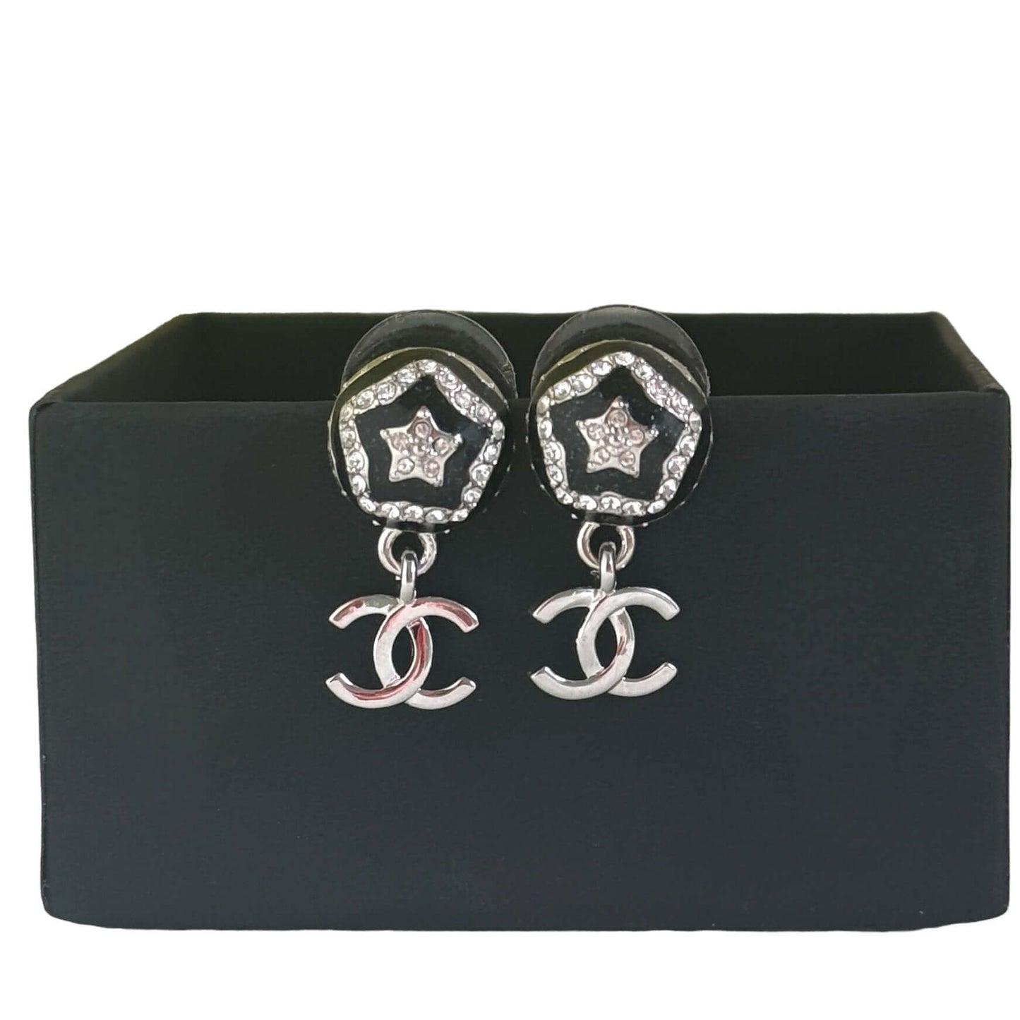 Chanel smaller black and silver enamel dangle earrings with star pattern and mini CC design, perfect updated designer jewelry piece.