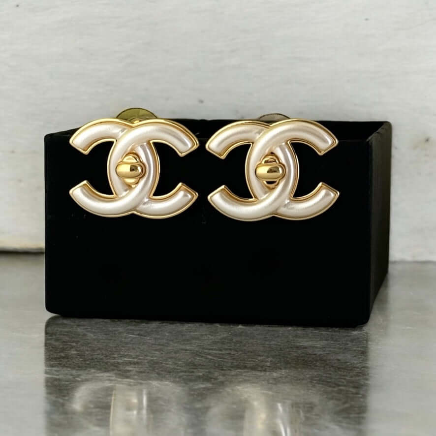 Authentic Chanel Gold CC with White Enamel Lock Earrings Pre-Owned