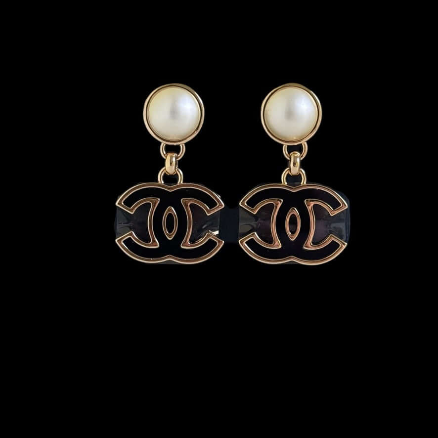 Authentic Chanel CC Gold White Black Dangle Earrings, Pre-Owned, like NEW, with pearl details and iconic design.