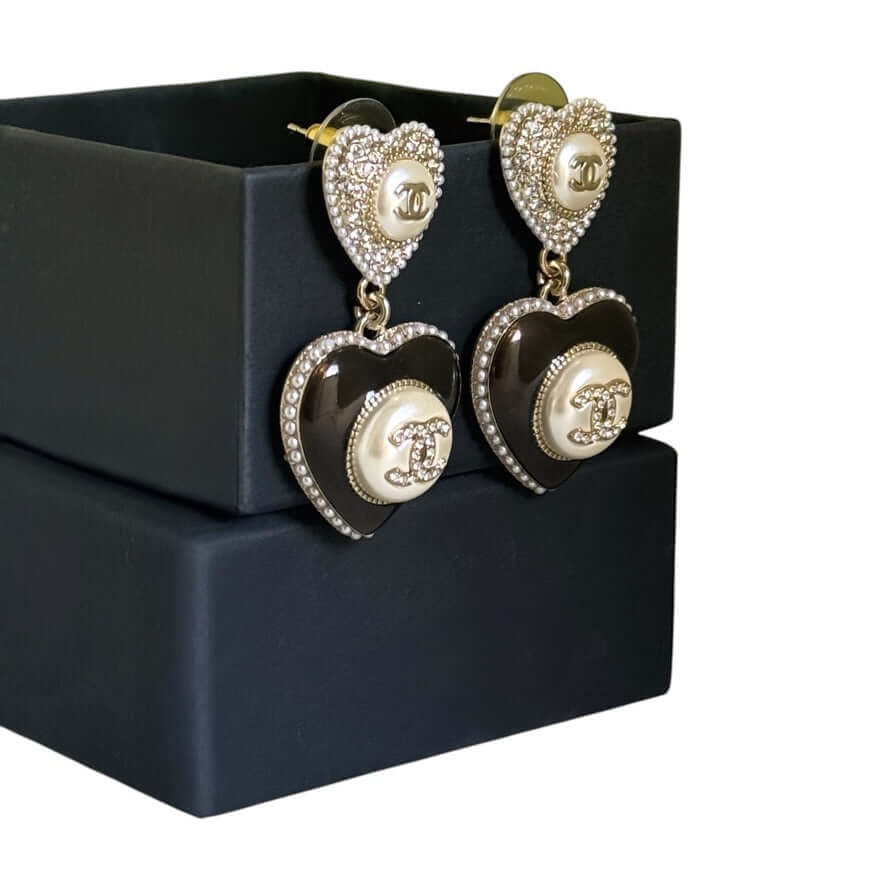 Stunning Pre-Owned Chanel Gold Heart CC Dangle Earrings with pearls and crystals in elegant gift box.