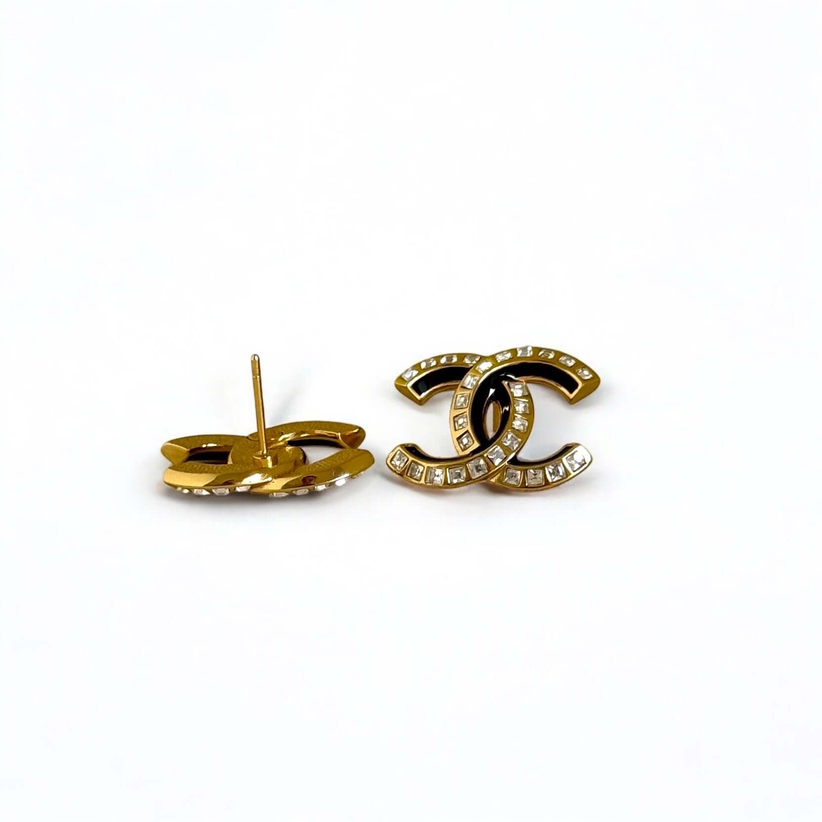 Pre-Owned CHANEL Strass CC Emerald Cut Crystals Earrings with black enamel, elegant design in excellent condition.