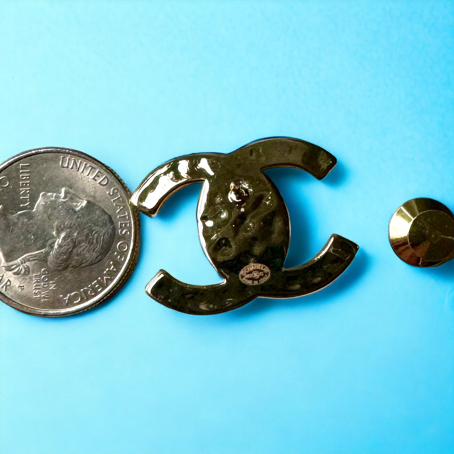 Chanel Strass Double C Lock Style Brooch PinFeaturing a timeless and elegant design, this brooch is perfect for any occasion. Made with a gold-plated double C and engraved with the brand's logo, this brooch is clearly stamped on the back and showcases a m My Mama Found What 