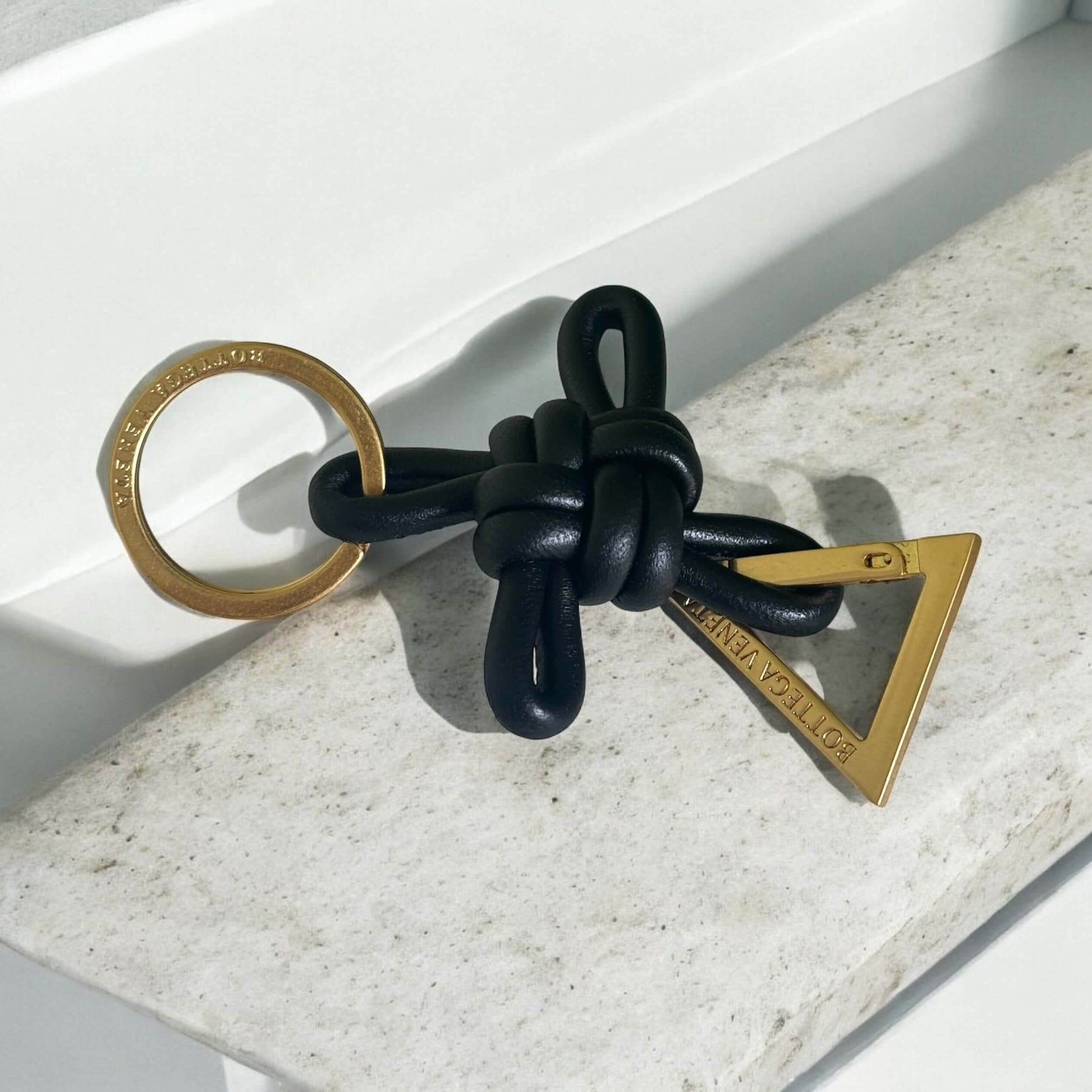 Bottega Veneta Black Leather Knotted Triangle Key Ring Never Used - My Mama Found What 