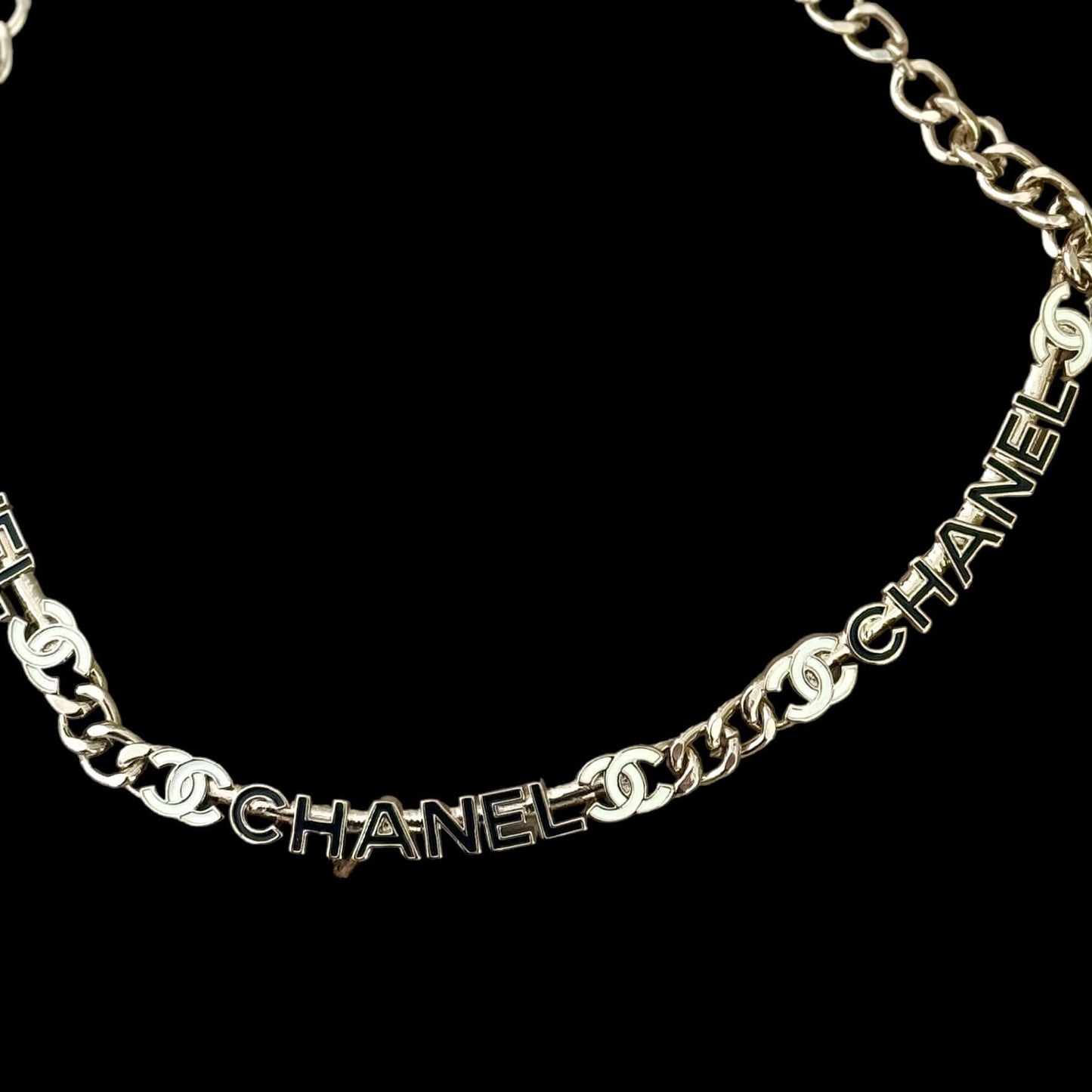 Chanel Strass Chain Adjustable Choker with black and white cut name pendants and gold chain, elegant black enamel petals, perfect luxury accessory. My Mama Found What 
