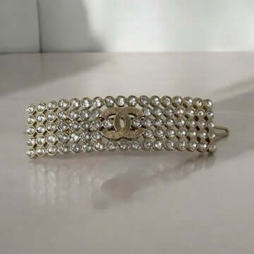Chanel CC Gold Crystals Barette featuring gold plating and clear crystals, Like New condition. View details for Chanel CC Gold Crystals Barette.