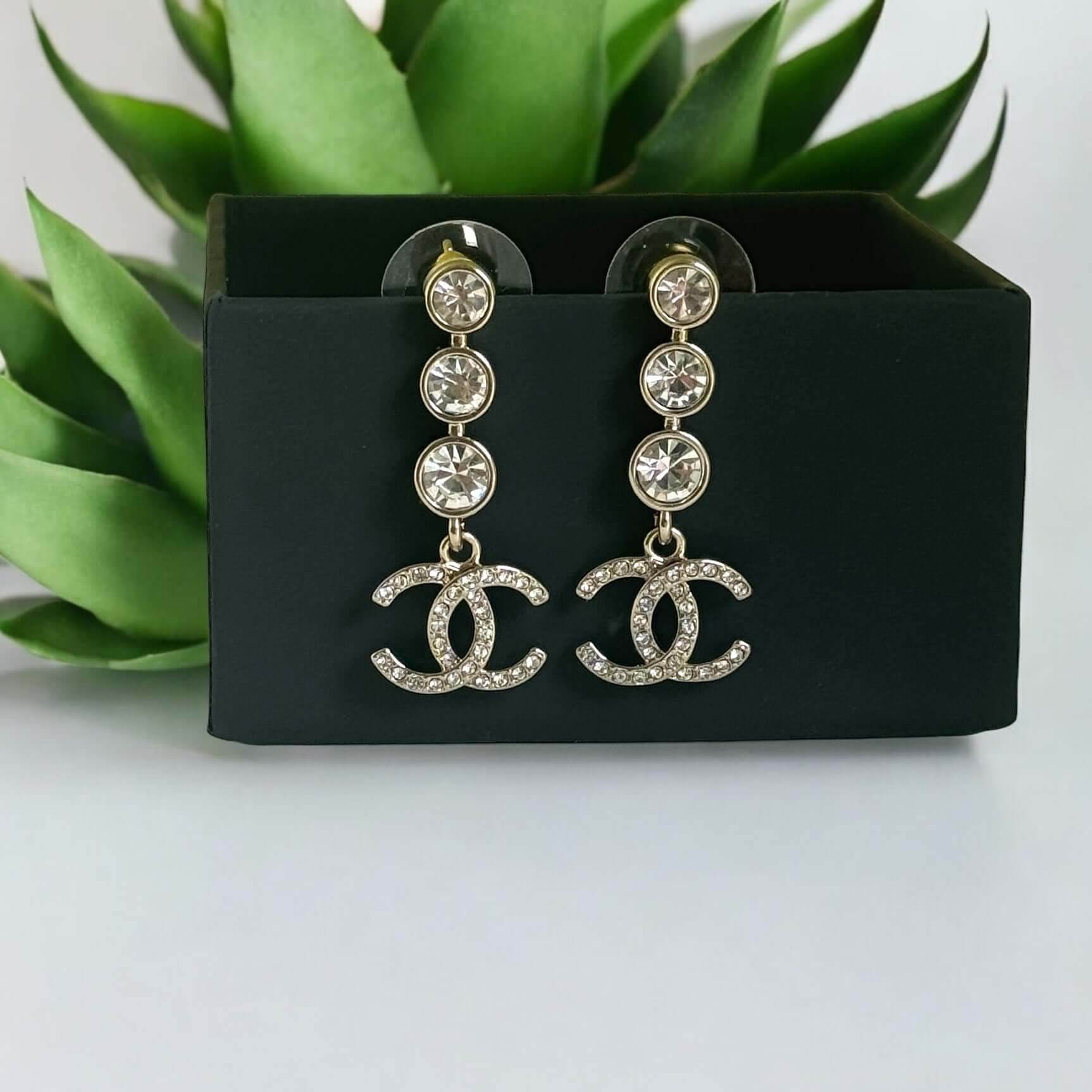 Chanel CC Silver w/ dangling crystals post earrings - My Mama Found What 
