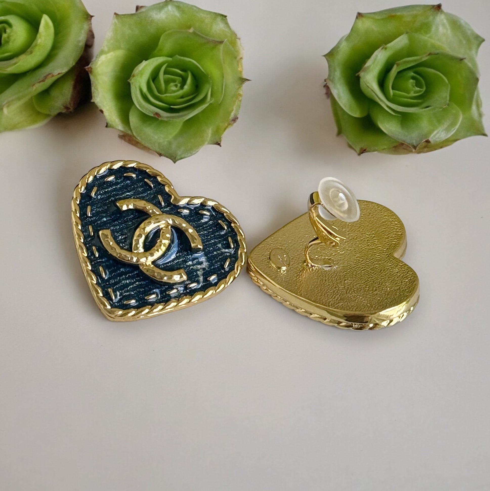 Chanel S24 Bright Gold Double C Heart Shaped With Blue Denim Style Enamel Clip OnStunning! Brand new and never been worn, these Chanel S24 Bright Gold Double C Heart Shaped With Blue Denim Style Enamel Clip On earrings are a must-have for your collection.