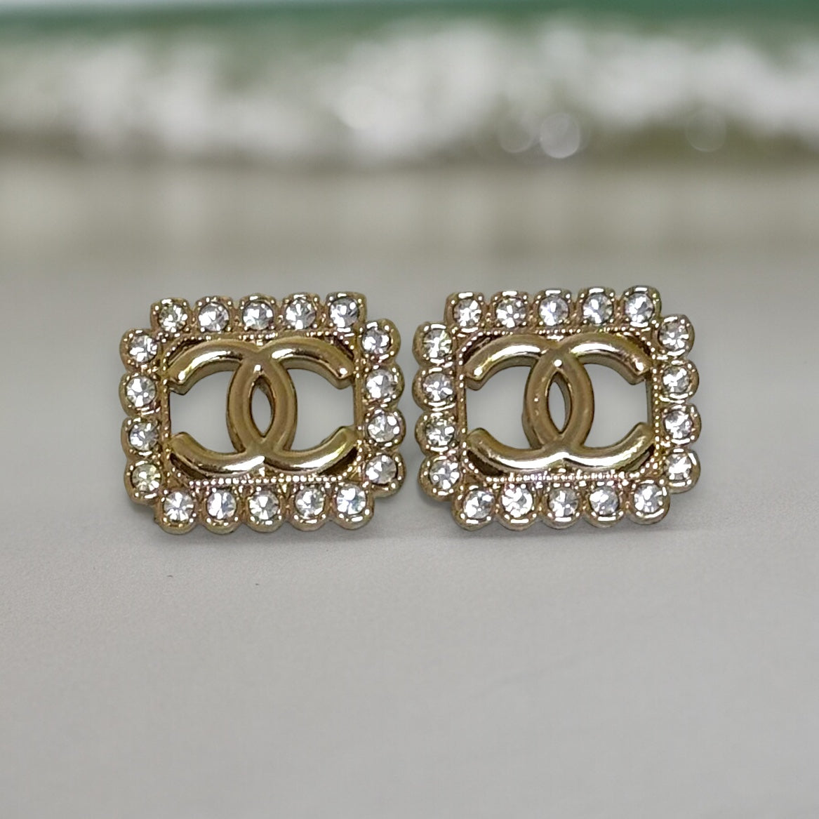Chanel Gold Double C cut out with bright clear crystals post earringsAdd some timeless and classic bling to your wardrobe with these gorgeous Chanel Gold Double C earrings. Their bright clear crystals add just the right amount of sparkle to any outfit, ma