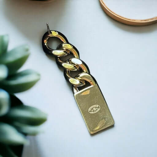 Chanel Gold Plated Chain Double C crystals Dangle EarringsAdd some rockstar flair to your wardrobe with these show-stopping Chanel Gold Plated Chain Double C crystals Dangle Earrings. The double C design and dangling movement make a statement that can't b