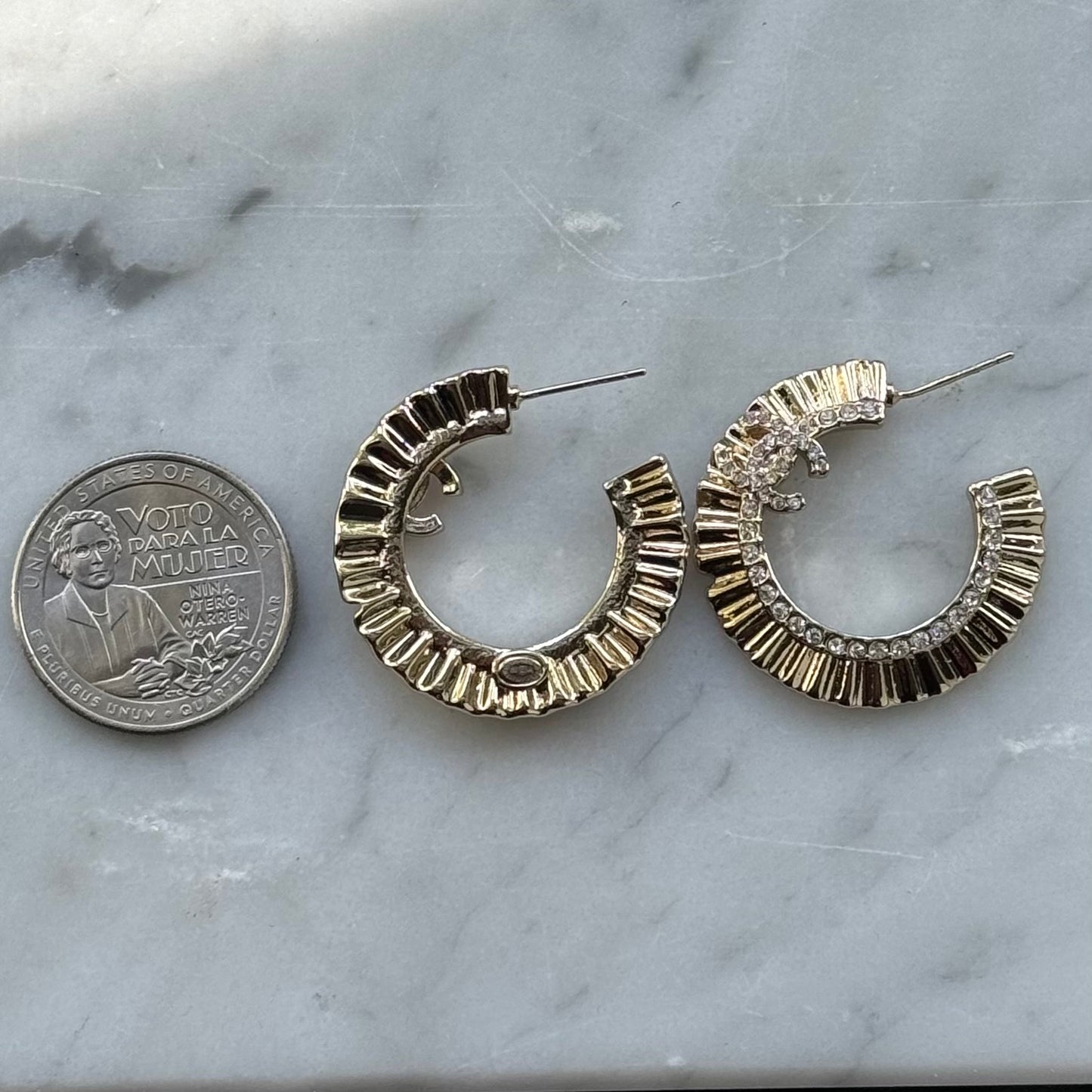 CHANEL CC authentic,pre-owned CHANEL jewelry, CC, Like New, luxury designer , gift , on sale, CHANEL ,hard to find Pre-Owned , Luxury Designer, Authentic Gold Plated Chanel Flatten Hoops with Crystals Post EarringsStunning ! Gold Plated Bigger Hoops with great head turning texture with clear crystals accented along the inner side of these Double C Post Earrings Comes with the Chanel Box & Bag In clean grea My Mama Found What 
