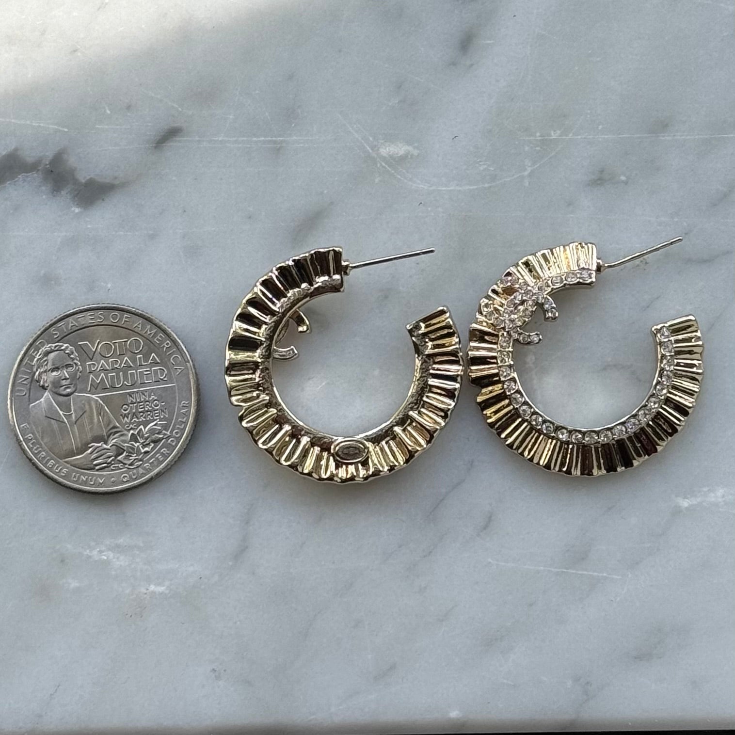 CHANEL CC authentic,pre-owned CHANEL jewelry, CC, Like New, luxury designer , gift , on sale, CHANEL ,hard to find Pre-Owned , Luxury Designer, Authentic Gold Plated Chanel Flatten Hoops with Crystals Post EarringsStunning ! Gold Plated Bigger Hoops with great head turning texture with clear crystals accented along the inner side of these Double C Post Earrings Comes with the Chanel Box & Bag In clean grea