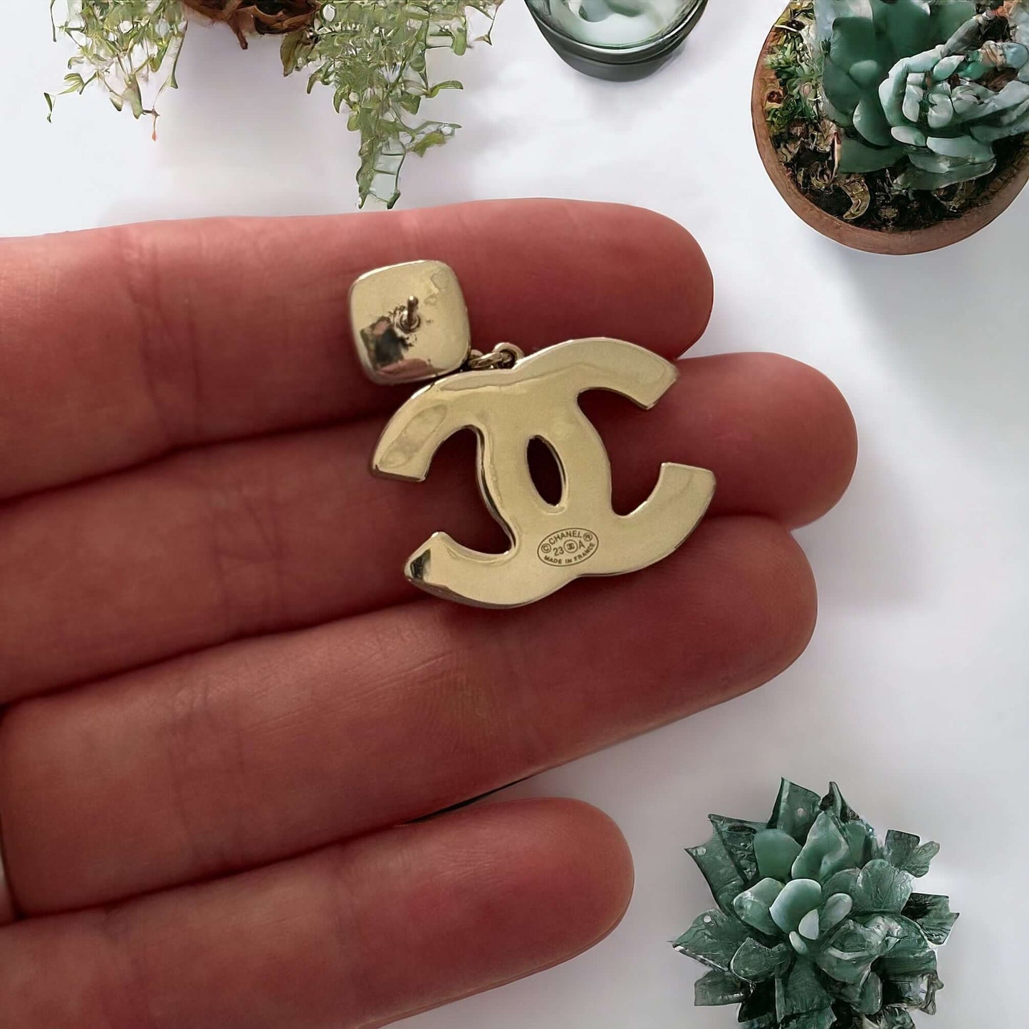Chanel Gold Setting Double C Dangle Post EarringsAdd a touch of glamour to your outfit with these gold Chanel earrings featuring a double C design. The dangle style, adorned with faux pearls, clear crystals, and black stones, will catch everyone's eye wit My Mama Found What 