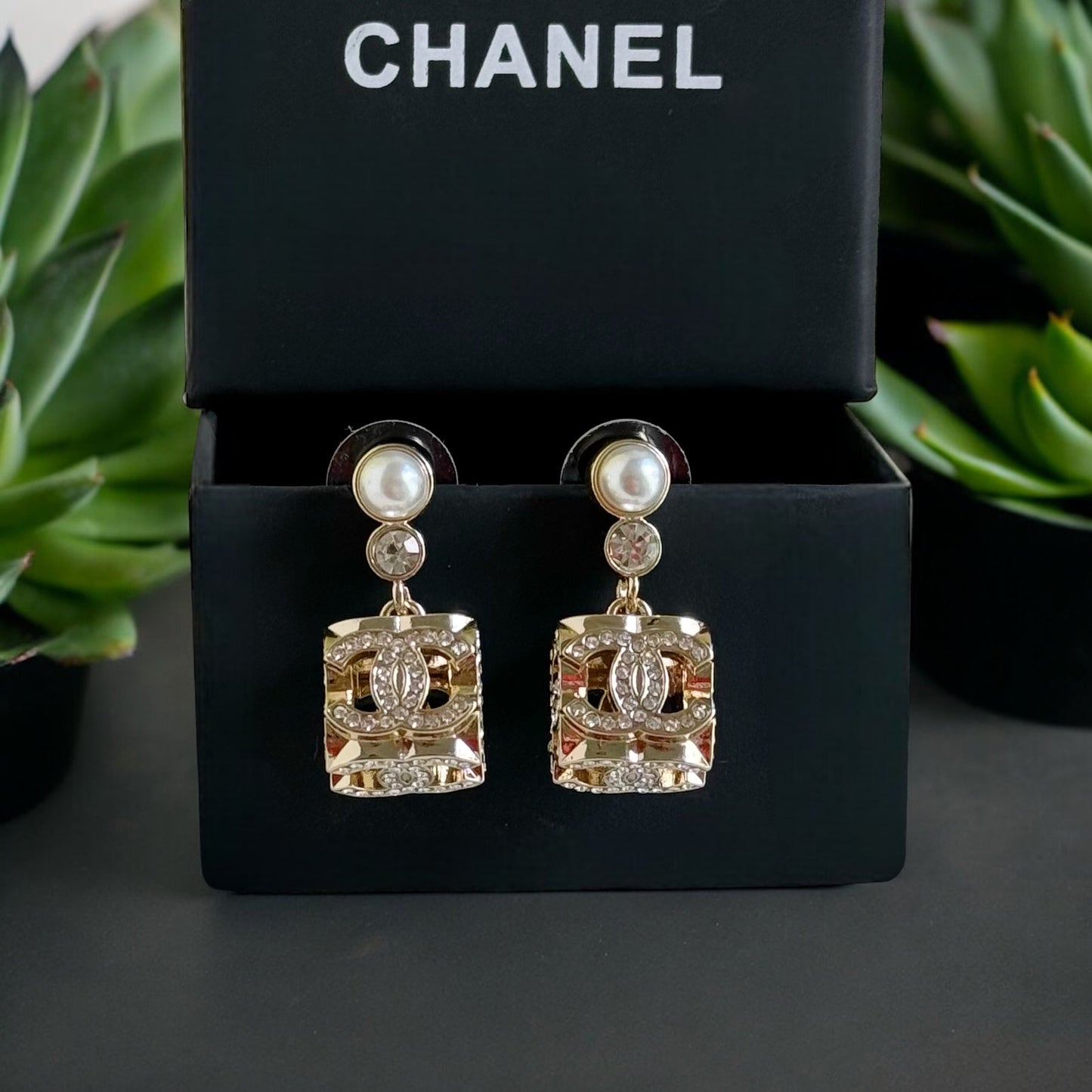 Chanel Gorgeous Rare Post Earrings with stunning Gold Double C encrusted clear crystalsThese Chanel earrings feature a stunning gold double C design, encrusted with clear crystals and a faux pearl center. The rare and like-new condition is reflected in th My Mama Found What 