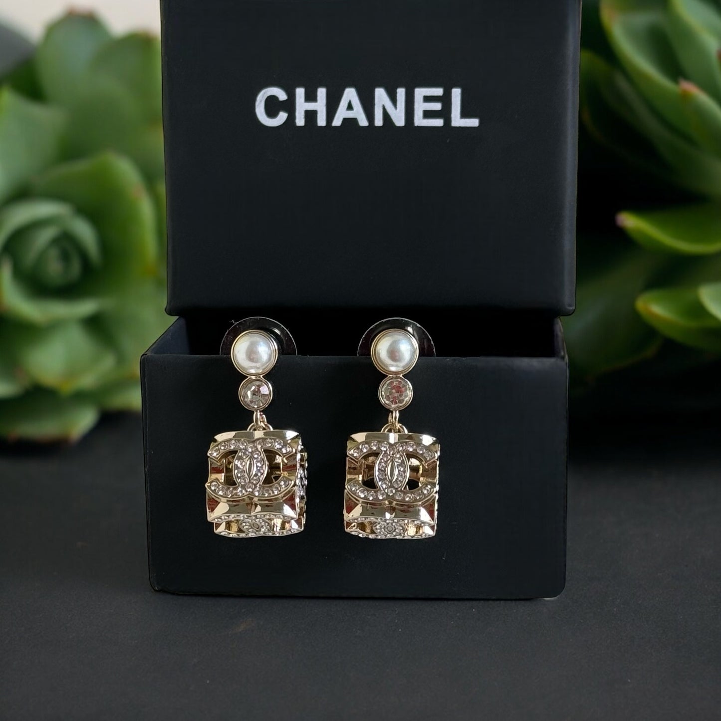 Chanel Gorgeous Rare Post Earrings with stunning Gold Double C encrusted clear crystalsThese Chanel earrings feature a stunning gold double C design, encrusted with clear crystals and a faux pearl center. The rare and like-new condition is reflected in th My Mama Found What 