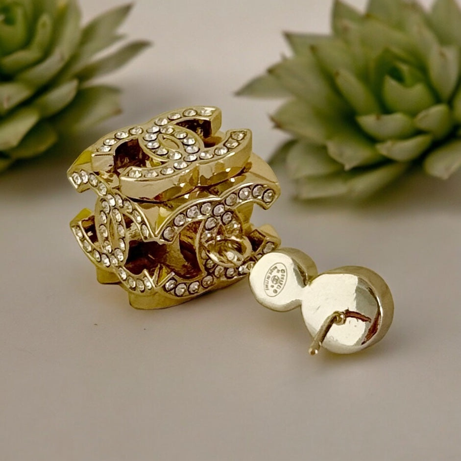Chanel Gorgeous Rare Post Earrings with stunning Gold Double C encrusted clear crystalsThese Chanel earrings feature a stunning gold double C design, encrusted with clear crystals and a faux pearl center. The rare and like-new condition is reflected in th My Mama Found What 