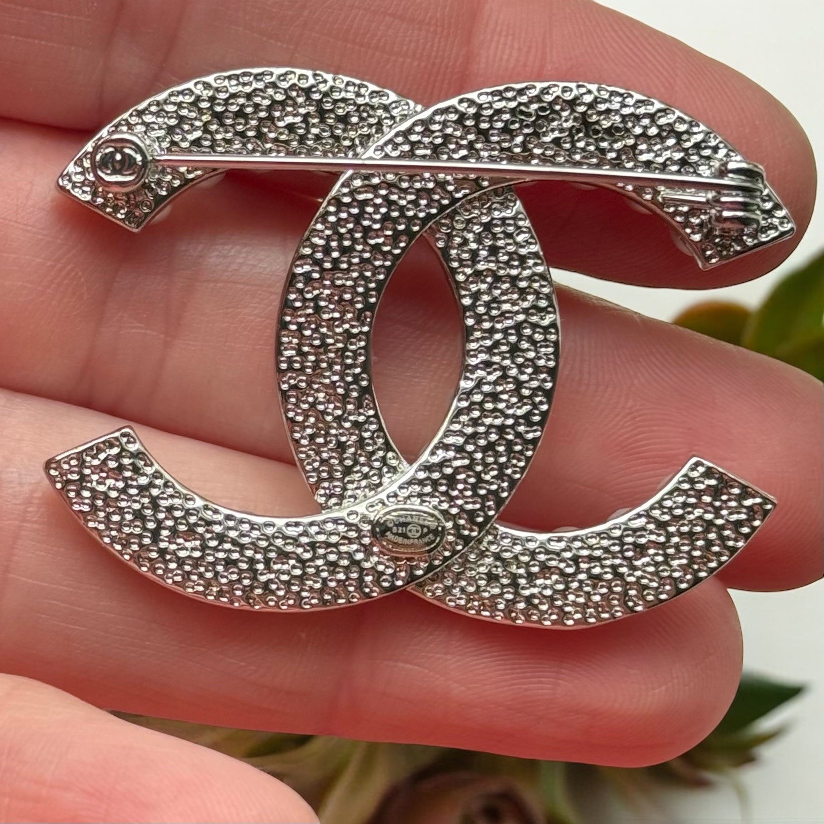 Chanel Silver Double C Brooch With Pearls & Crystals PinClassic , Clean Lines , minimalistic , elegant yet updated on trend Purchased at an Estate Sale Silver Double C with (faux) gorgeous pearls and clear crystals . In Like New Condition Free from dings