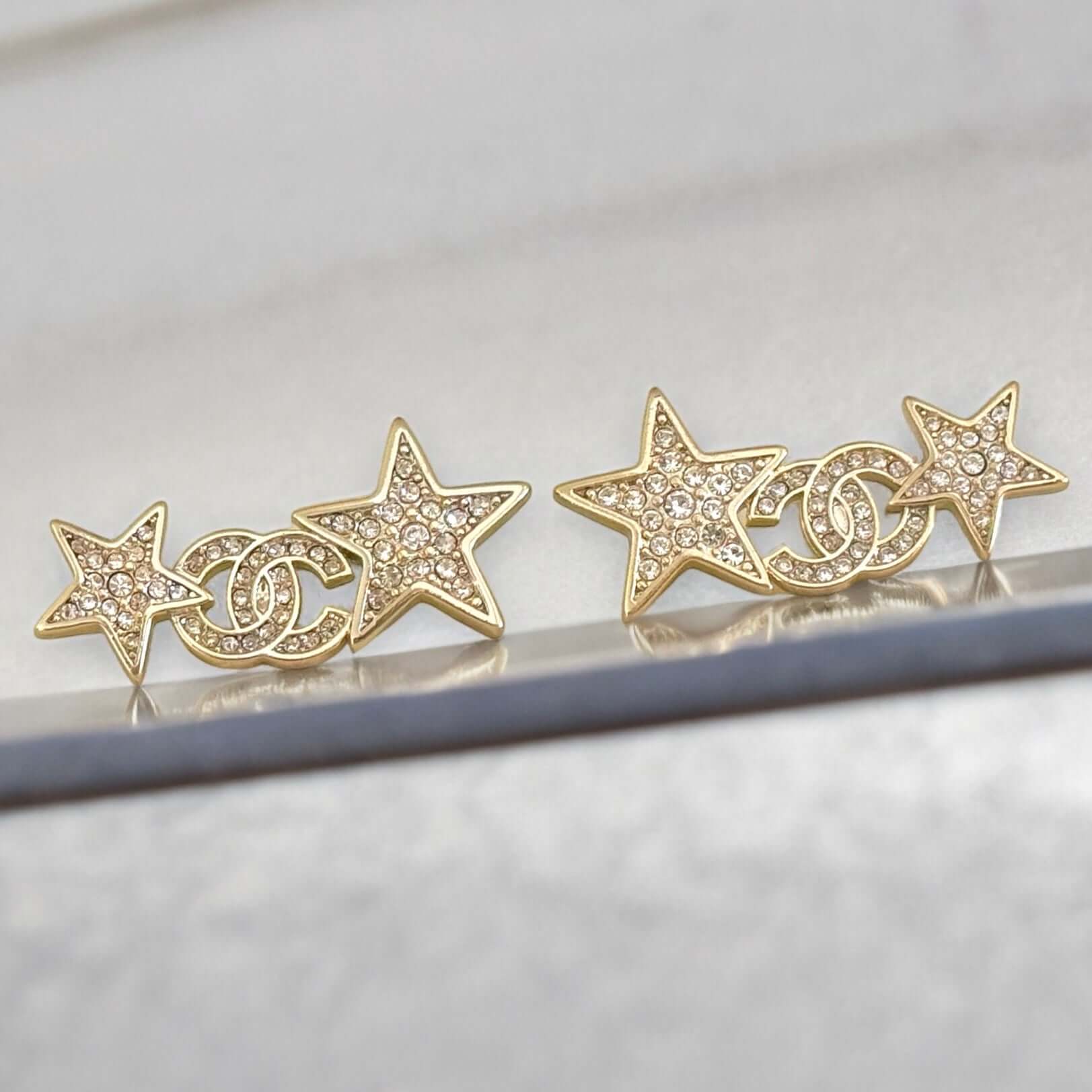 Chanel Stunning Star w/ CC Lighter Gold w/ Crystals Post Earrings Pre-Owned - My Mama Found What  