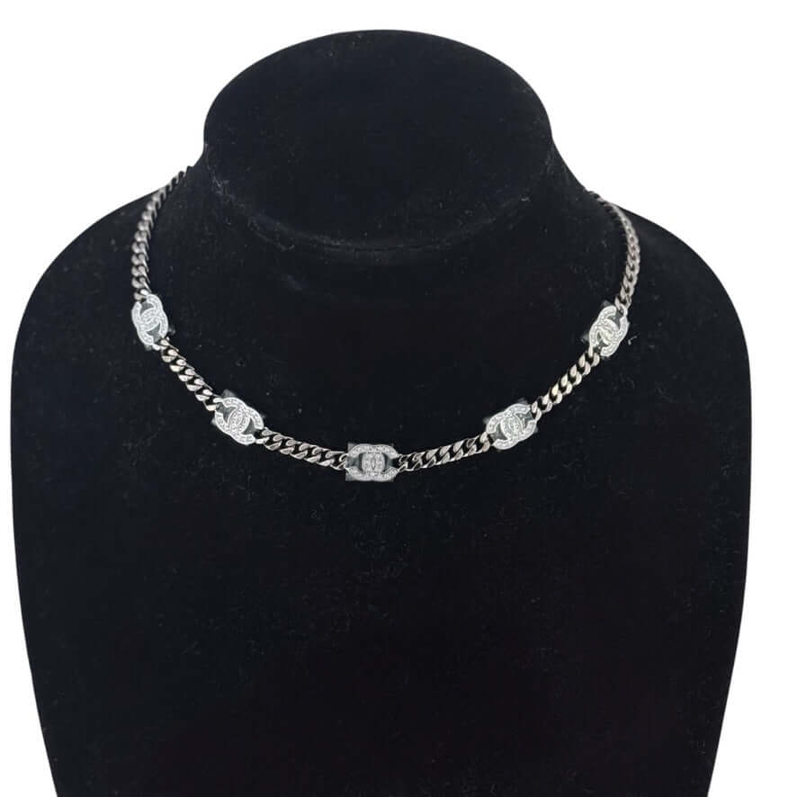 Authentic Chanel CC Choker in gun metal chain, featuring crystal encrusted CC logos, perfect for stylish gift-giving.