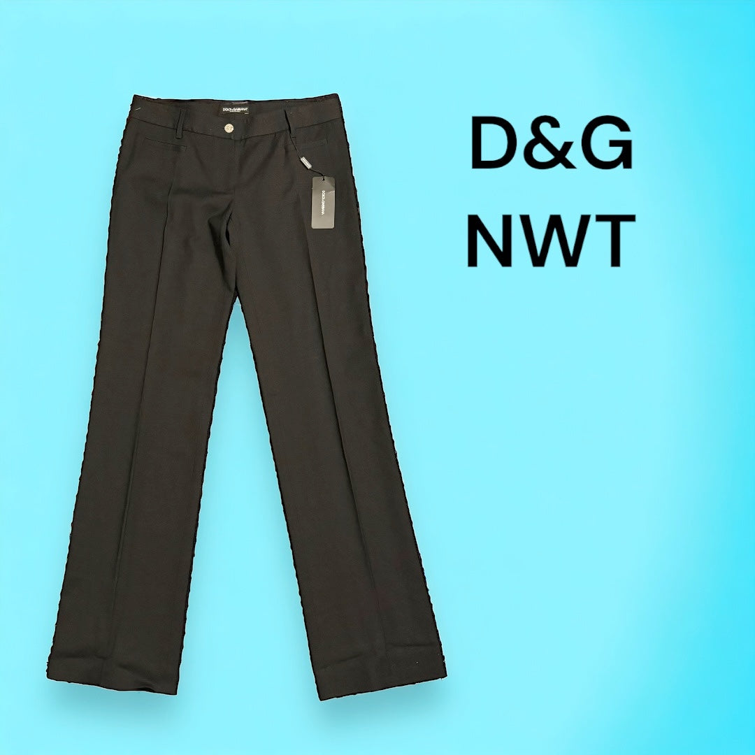 Dolce & Gabbana New Vintage Women’s Black Straight Leg PantsUpgrade your work wardrobe with these designer vintage Dolce & Gabbana black straight leg pants. Made with Y2K style in mind, these career slacks are new with tags and retired out of stock. Don't My Mama Found What 