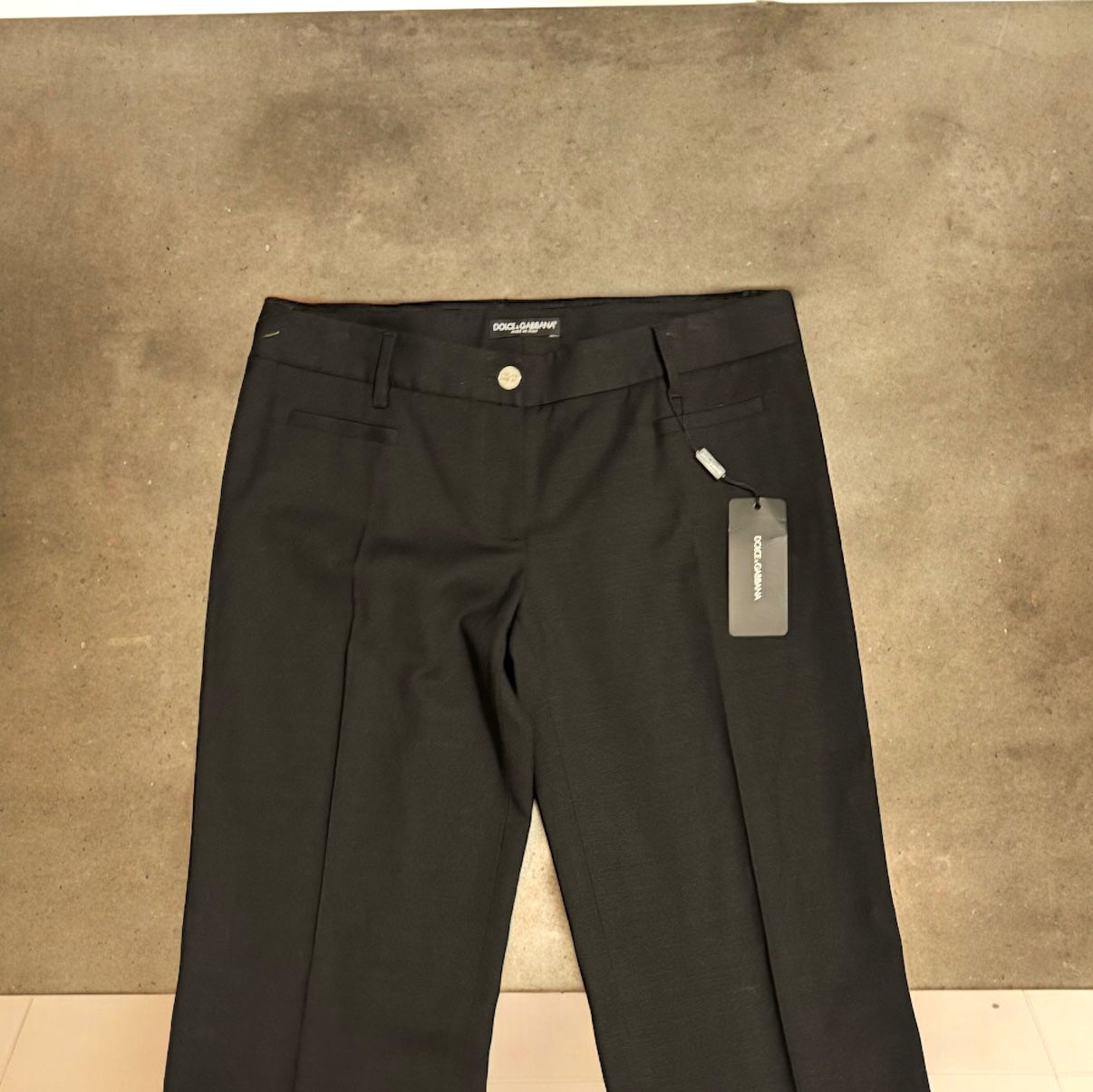 Dolce & Gabbana New Vintage Women’s Black Straight Leg PantsUpgrade your work wardrobe with these designer vintage Dolce & Gabbana black straight leg pants. Made with Y2K style in mind, these career slacks are new with tags and retired out of stock. Don't My Mama Found What 