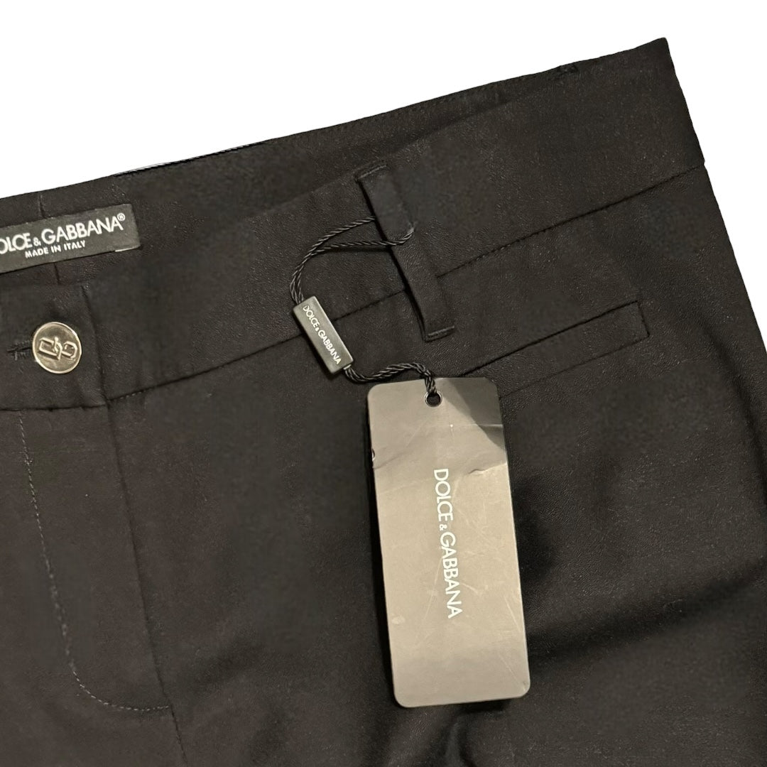 Dolce & Gabbana New Vintage Women’s Black Straight Leg PantsUpgrade your work wardrobe with these designer vintage Dolce & Gabbana black straight leg pants. Made with Y2K style in mind, these career slacks are new with tags and retired out of stock. Don't