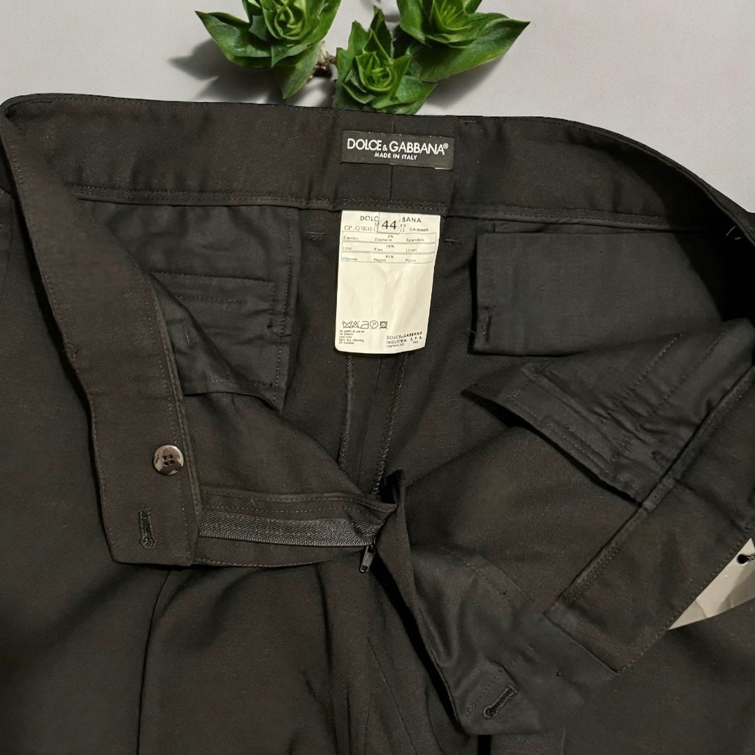 Dolce & Gabbana New Vintage Women’s Black Straight Leg PantsUpgrade your work wardrobe with these designer vintage Dolce & Gabbana black straight leg pants. Made with Y2K style in mind, these career slacks are new with tags and retired out of stock. Don't