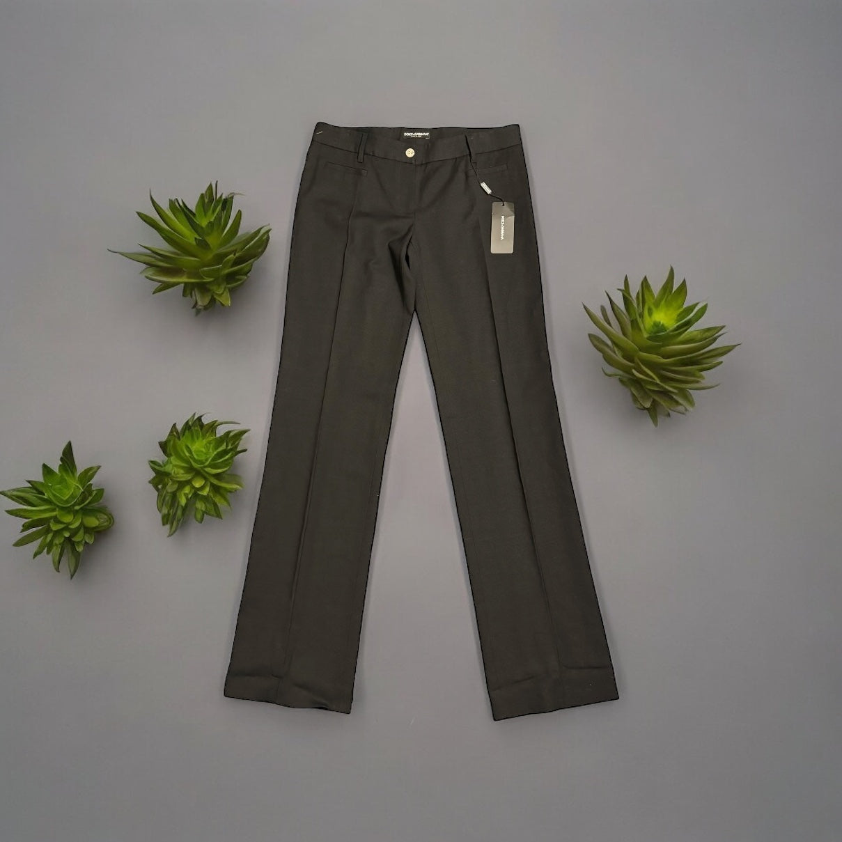 Dolce & Gabbana New Vintage Women’s Black Straight Leg PantsUpgrade your work wardrobe with these designer vintage Dolce & Gabbana black straight leg pants. Made with Y2K style in mind, these career slacks are new with tags and retired out of stock. Don't