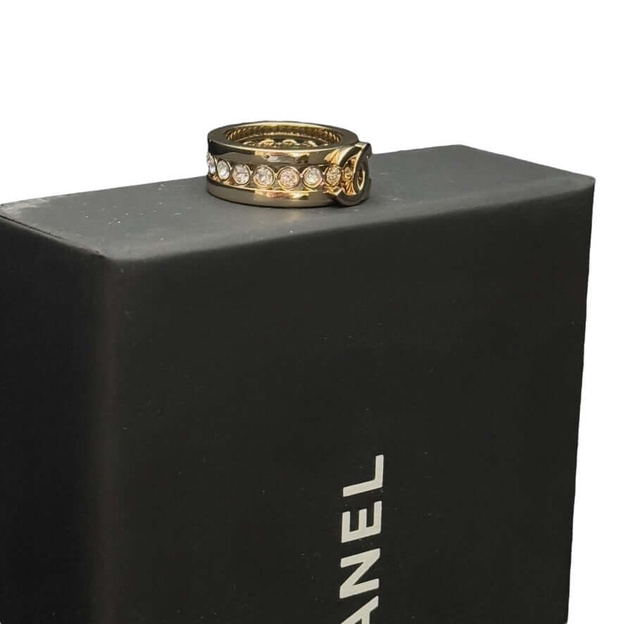 Rare CHANEL CC Gold Ring with Crystals on display, pre-owned and in excellent condition, perfect for gifting.