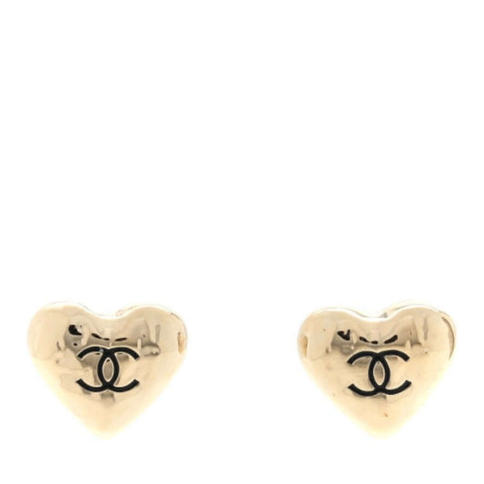 Chanel gold plated puffy heart earrings with black enamel CC logo, pre-owned in excellent condition.