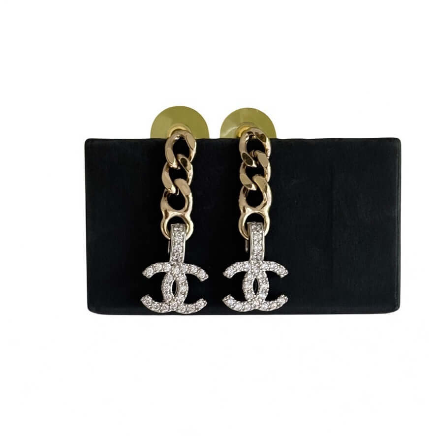 Chanel CC Gold Chain Drop Crystal Encrusted Earrings on black display, pre-owned and in excellent condition.