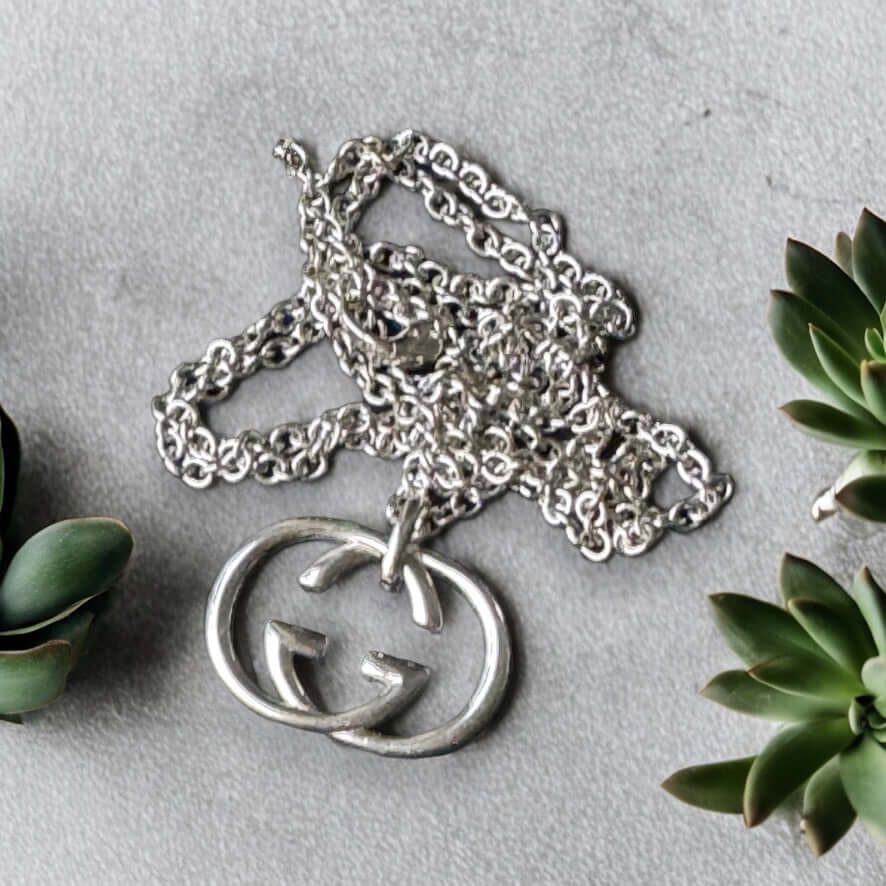 Gucci New Sterling Double G Marmont Pendant Necklace"Take risks with the Gucci New Sterling Double G Marmont Pendant Necklace. Made of stunning sterling silver, the minimalistic design features a bold Double G charm, creating a statement piece for any out My Mama Found What 