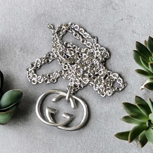 Gucci New Sterling Double G Marmont Pendant Necklace"Take risks with the Gucci New Sterling Double G Marmont Pendant Necklace. Made of stunning sterling silver, the minimalistic design features a bold Double G charm, creating a statement piece for any out My Mama Found What 