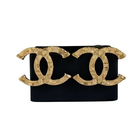 Authentic Chanel Strass Textured CC Pre-Owned Earrings in gold, displayed on a black background, like new condition with original box.