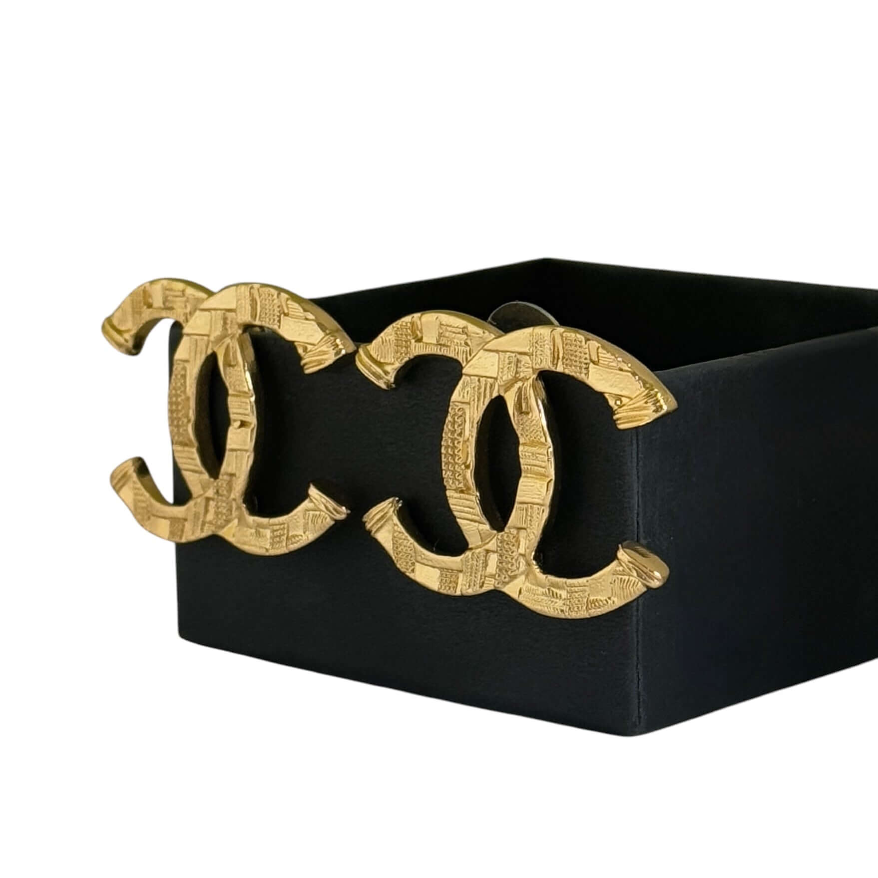 Authentic CHANEL Gold Textured CC Pre-Owned Earrings displayed in original box, showcasing their bold and minimalist design.