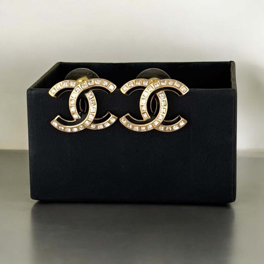 Pre-Owned CHANEL Strass CC Earrings with Emerald Cut Crystals and Black Enamel in elegant display box.