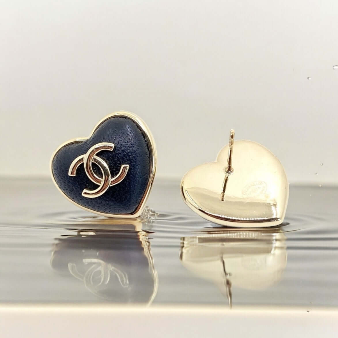 Pre-Owned Chanel Gold CC Black Leather Heart Shaped Post Earrings