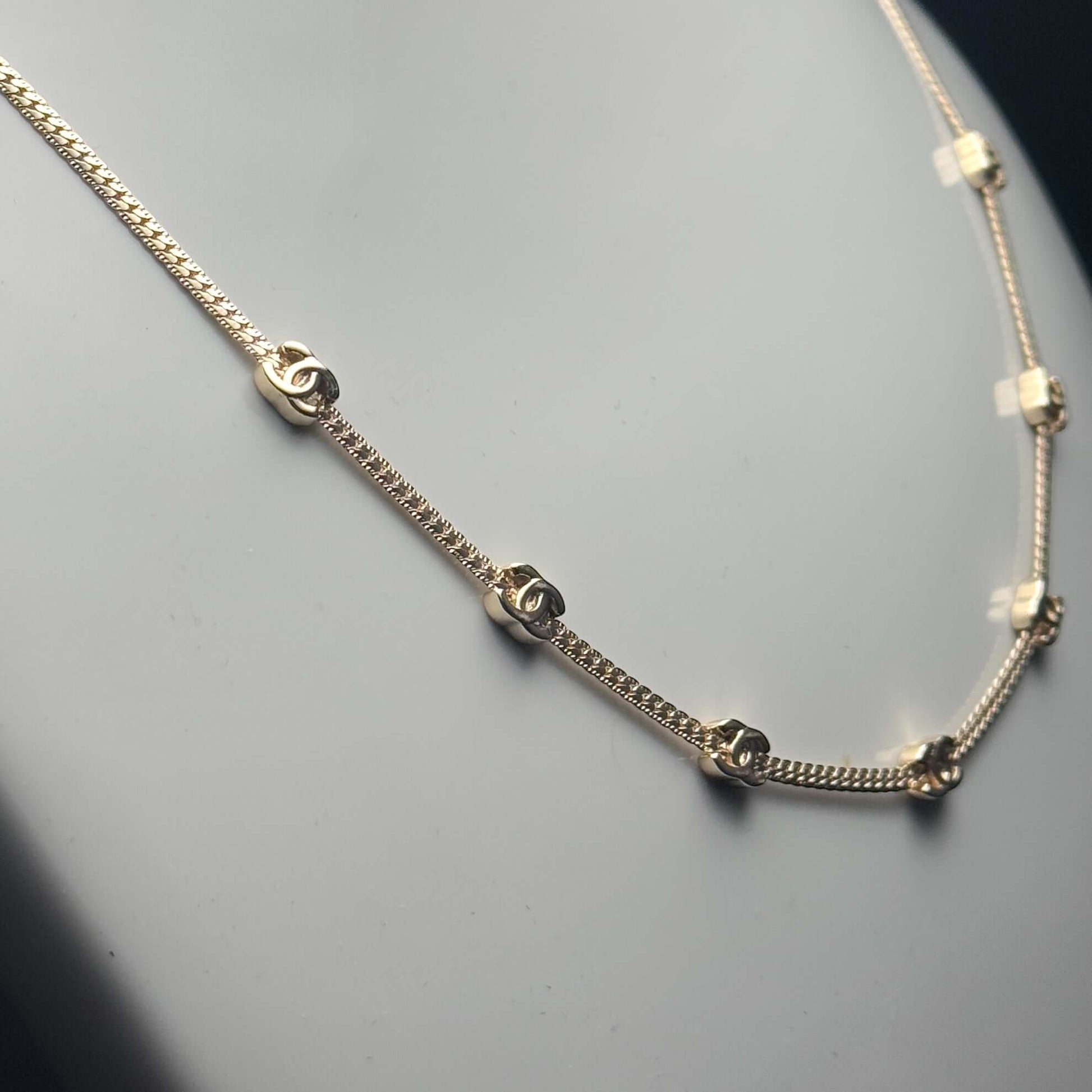 CHANEL CC Gold Chain necklace featuring mini CC details, adjustable choker style in pre-owned condition. Perfect for gifting.