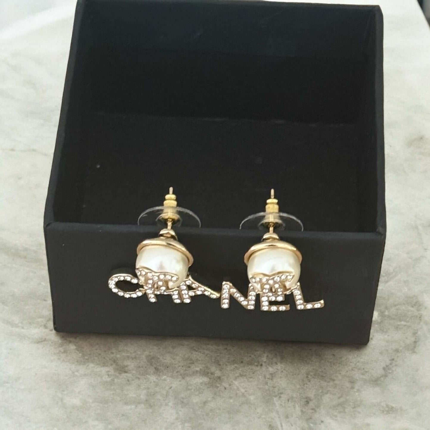 Chanel Gold Earrings with Crystal Encrusted "CHA" "NEL" on Black Box.