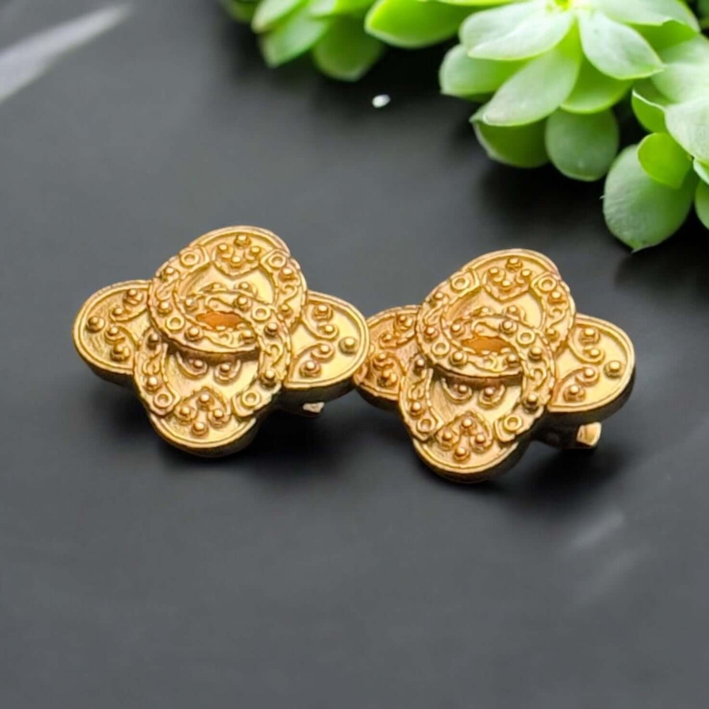 Vintage Chanel Gold Baroque CC Intricate Clip On Earrings in excellent pre-owned condition, showing exquisite detailing.