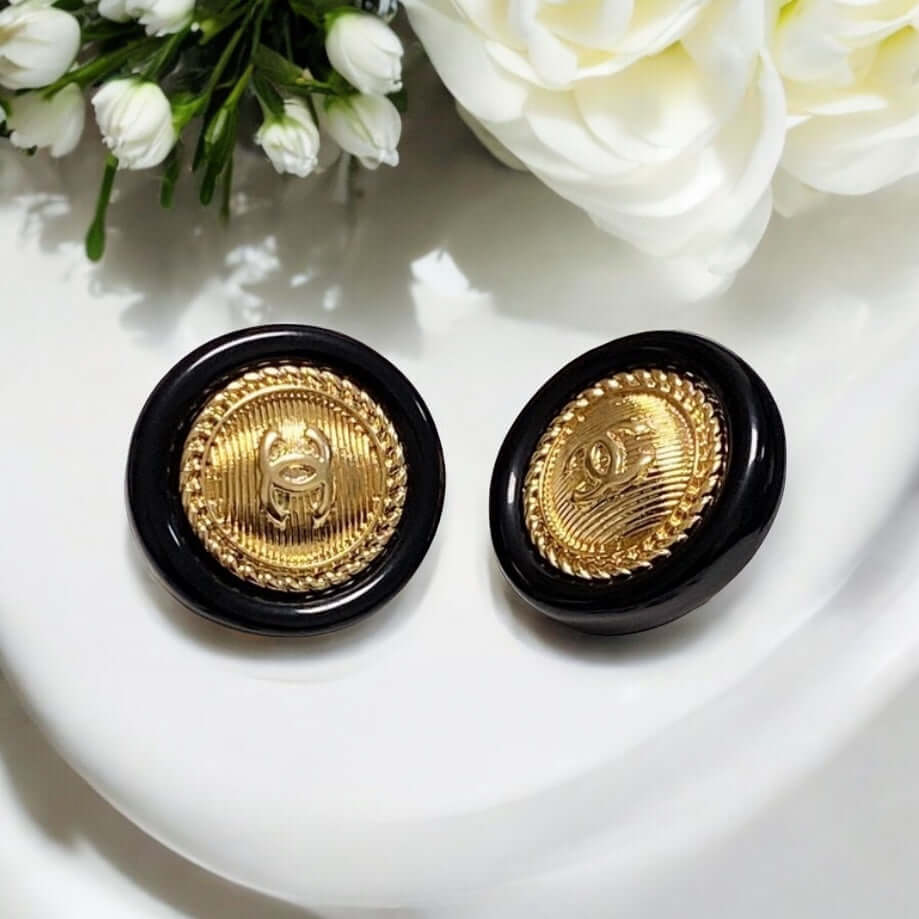 Chanel Rare Gold CC Round acrylic clip on earrings Pre-Owned